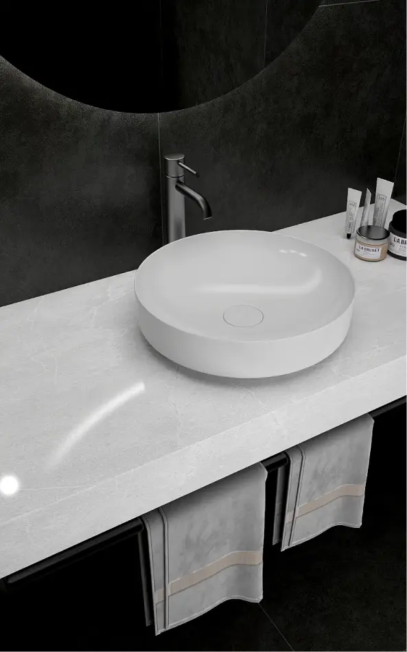 a white sink on a counter